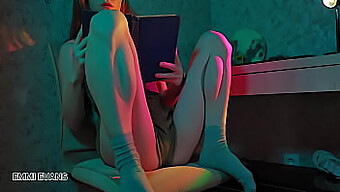 A Seductive Redhead Indulges In Solo Pleasure While Engrossed In Her Reading