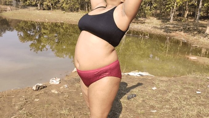 Big-Breasted Desi Aunty Takes A Bath In The Wild