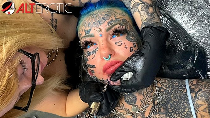 Beautiful Girl With Tattoos Gets A Facial Piercing